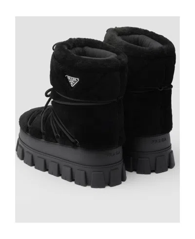 Prada Shearling And Rubber Ankle Boots With Fur Texture In Black