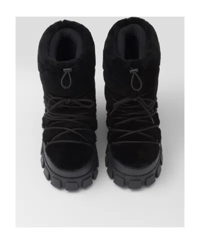 Prada Shearling And Rubber Ankle Boots With Fur Texture In Black