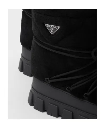 Prada Shearling And Rubber Ankle Boots With Fur Texture In Black