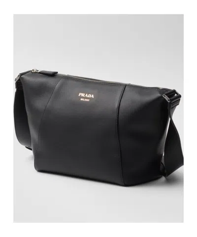 Prada Logo Print Leather Messenger Bag In Black