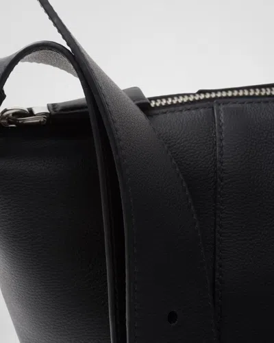 Prada Logo Print Leather Messenger Bag In Black