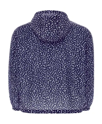 Prada Chest Placement Patterned Lightweight Windbreaker In Blue