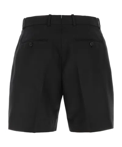 Alexander Mcqueen Men Black Wool Blend Bermuda Shorts In Black