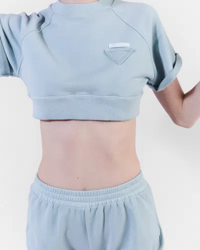 Prada Triangle-patch Jersey Mini Shorts In Blue