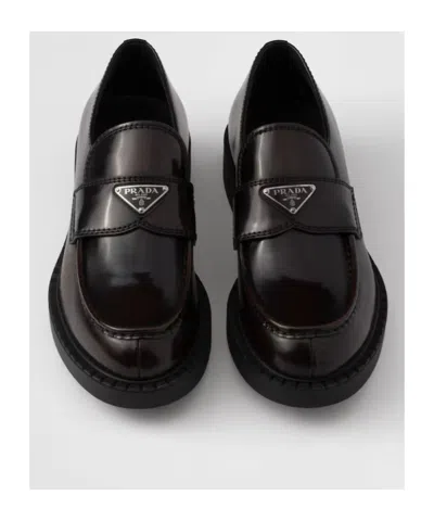Prada Triangle Logo Chocolate Brushed Leather Loafers In Black