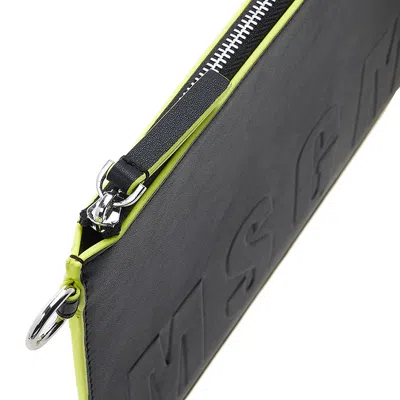 Msgm Embossed-logo Clutch Bag In Black