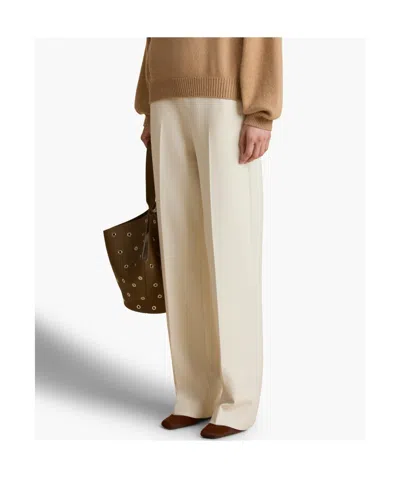 Khaite Cambie Straight-leg Crepe Pants In Cream