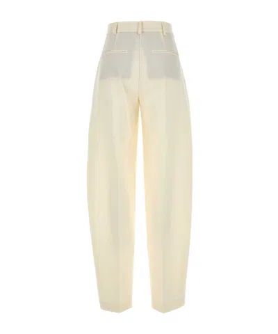 The Andamane Gabardine Trousers With Back Pockets And Pleated Design In Ivory