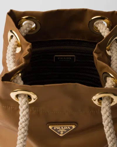 Prada Re-nylon Mariner Bucket Bag With Braided Handles In Brown