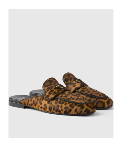 Prada Leather Leopard Logo Mules In Animal Print