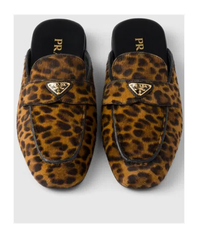 Prada Leather Leopard Logo Mules In Animal Print