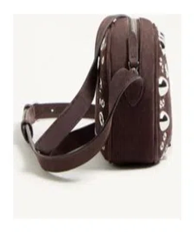 Valentino Garavani Dome-shaped Crossbody Bag With Metallic Eyelets And Adjustable Strap In Brown