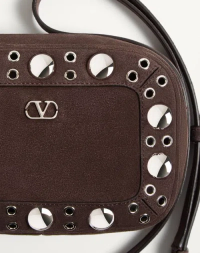 Valentino Garavani Dome-shaped Crossbody Bag With Metallic Eyelets And Adjustable Strap In Brown