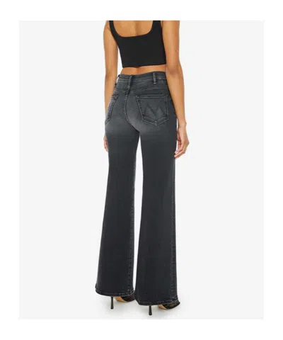 Mother The Roller Sneak Flared Jeans In Black