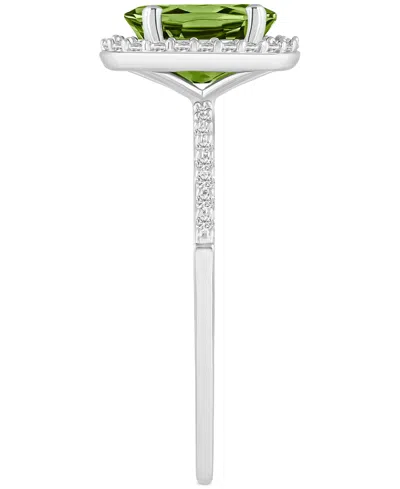 Macy's Blue Topaz (1-3/5 Ct. T.w.) & Lab Created White Sapphire (1/5 Ct. T.w.) Oval Halo Ring In 10k White In Peridot,white Gold