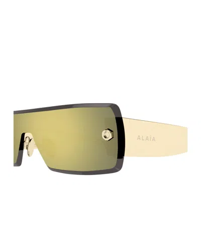 Alaïa Aa0083s Rectangular Shield Sunglasses With Translucent Temples In Green