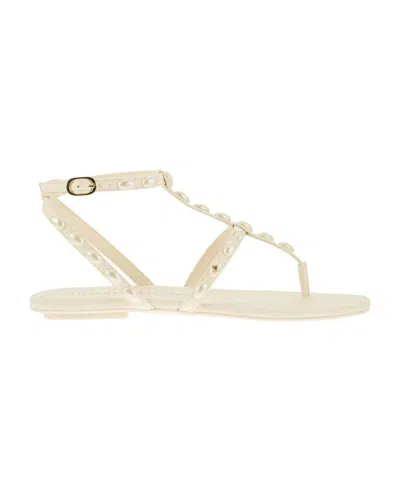 Stuart Weitzman Pearlita Stud T-strap Sandals In Gold