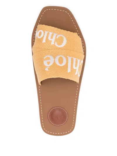 Chloé Woody Embroidery Flat Slides In Yellow