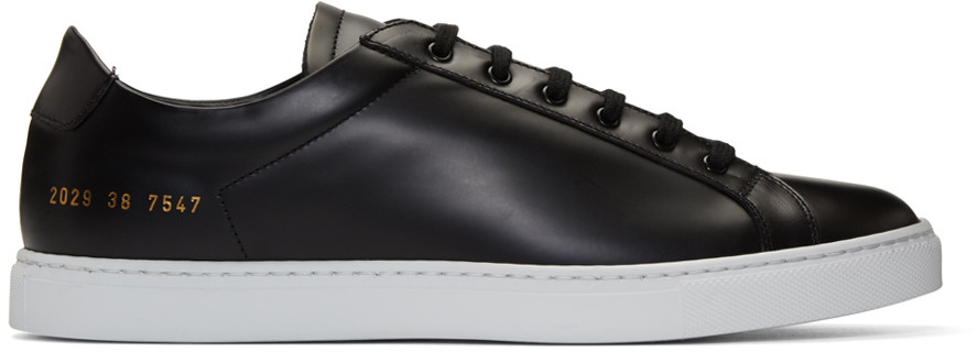 black leather white sole sneakers