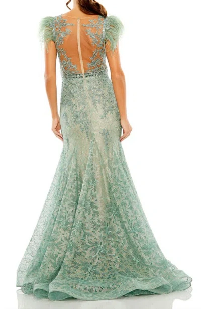 Mac Duggal Embellished Feather Cap Sleeve Illusion Neck Trumpet Gown In Green