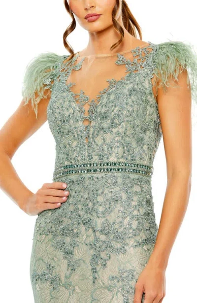 Mac Duggal Embellished Feather Cap Sleeve Illusion Neck Trumpet Gown In Green