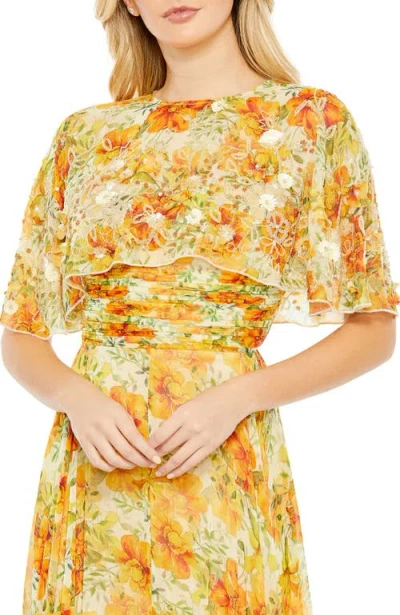 Mac Duggal Floral Print High Neck Cape Sleeve A Line Gown In Yellow Multi