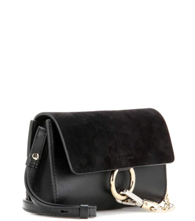 Shop Chloé Faye Leather Clutch In Black