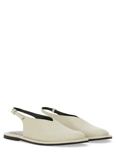 Studio Nicholson Minimalist Slingback Flats In White