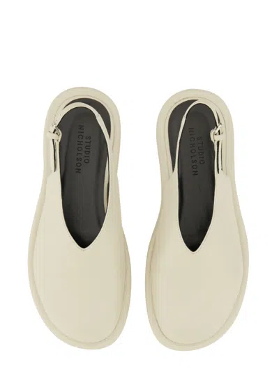 Studio Nicholson Minimalist Slingback Flats In White