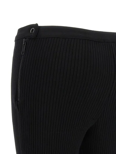 Shop Courrèges Trousers In Black