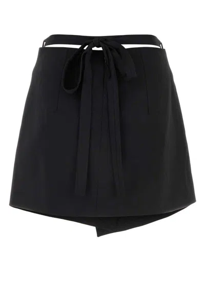 Patou Stretch Wool Mini Skirt With High Waist And A-line Silhouette In Black