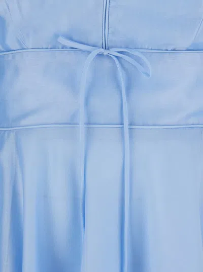 Plain Light Blue Dress With V-neck And Flared Skirt In Blue