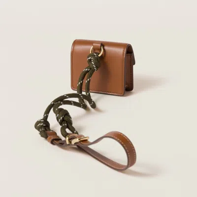 Miu Miu Leather And Cord Trick In Cognac/forest Green