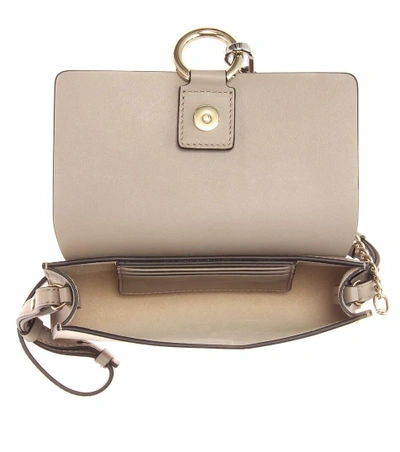 Shop Chloé Faye Mini Leather Wallet Bag In Grey