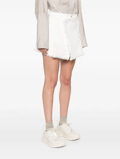 Sacai Mixed Denim Pleated Shorts