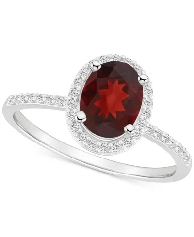 Macy's Blue Topaz (1-3/5 Ct. T.w.) & Lab Created White Sapphire (1/5 Ct. T.w.) Oval Halo Ring In 10k White In Garnet,white Gold