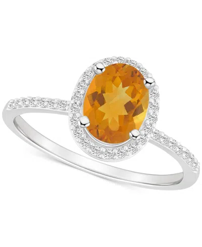 Macy's Blue Topaz (1-3/5 Ct. T.w.) & Lab Created White Sapphire (1/5 Ct. T.w.) Oval Halo Ring In 10k White In Citrine,white Gold