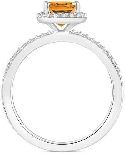 Macy's Blue Topaz (1-3/5 Ct. T.w.) & Lab Created White Sapphire (1/5 Ct. T.w.) Oval Halo Ring In 10k White In Citrine,white Gold