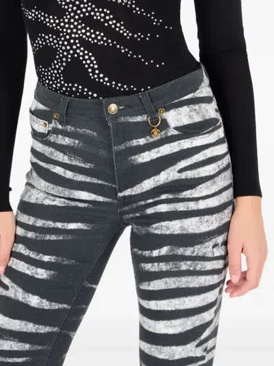 Roberto Cavalli Zebra-print Flared Jeans In Black