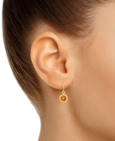 Macy's Created Sapphire Oval Stud Earrings (1-1/2 Ct. T.w.) In 10k Yellow Gold (also In Additional Gemstone In Citrine,gold