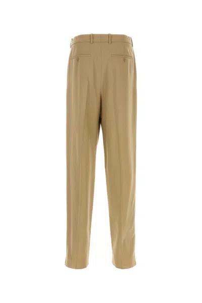 Saint Laurent High Waist Carrot Fit Wool Trousers In Gingembre