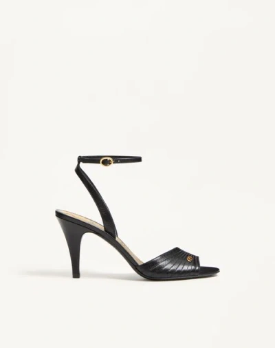 Valentino Garavani Rockstud Ankle-strap Flat Sandals In Black