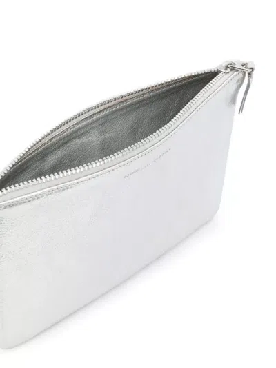 Comme Des Garçons Logo Embossed Metallic Finish Zip Wallet In White