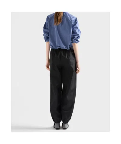 Prada Re-nylon Joggers In Black