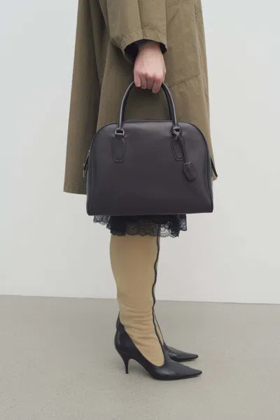 The Row India Medium Leather Tote Bag In Black