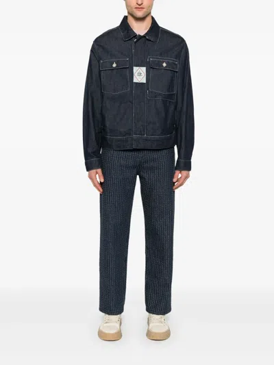 C.p. Company Blue Jacket With Classic Collar And Logo Patch On The Front In Blue
