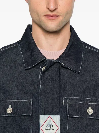 C.p. Company Blue Jacket With Classic Collar And Logo Patch On The Front In Blue
