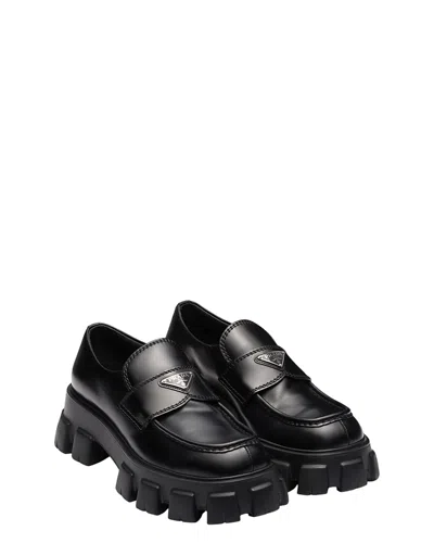 Prada Tread Sole Triangular Logo Plaque Leather Penny Loafers In Black