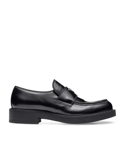 Prada Triangle Logo Chocolate Brushed Leather Loafers In Black