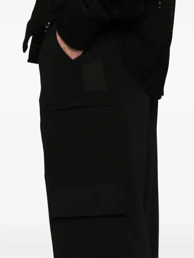 Namacheko Guardia Trousers Featuring Multiple Pockets In Black